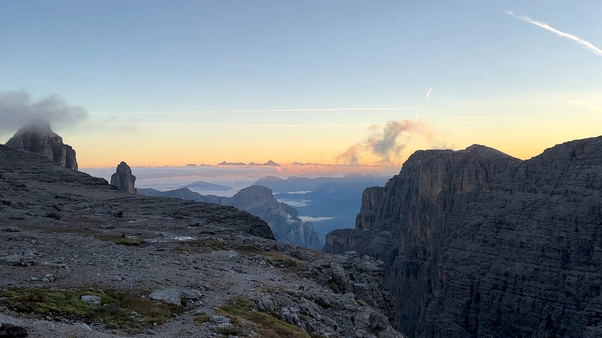 Sunrise over the Dolomites with mountain peaks view from Rifugio Boè along the Alta Via 2.